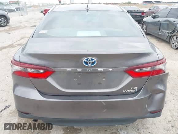 2022 Toyota Camry Hybrid LE with VIN 4T1C31AK6NU591599, listed as a IAAI auction lot 42122052 with 87,292 mi miles and . Bid and sale history available at DreamBid. Image 16.