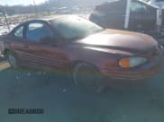 ✅ 2000 Pontiac Grand Am • VIN: 1G2NE12T5YM799819 • Lot: 43827279. Listed on IAAI with 167,017 mi. Free auction sales archive from the USA and detailed vehicle history report at DreamBid. Image 1.