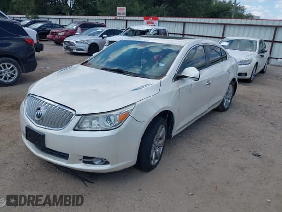 ✅ 2012 Buick LaCrosse Touring • VIN: 1G4GJ5E3XCF271124 • Lot: 43330310. Listed on IAAI with 168,070 mi. Free auction sales archive from the USA and detailed vehicle history report at DreamBid. Image 2.