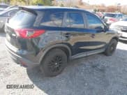 ✅ 2016 Mazda CX-5 Sport • VIN: JM3KE4BY7G0654189 • Lot: 43563266. Listed on IAAI with 150,321 mi. Free auction sales archive from the USA and detailed vehicle history report at DreamBid. Image 4.