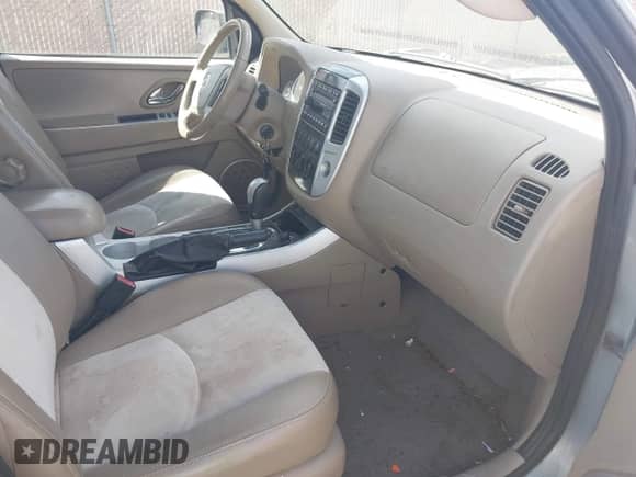 2006 Mercury Mariner Luxury z VIN 4M2CU57196KJ13921, wystawiony jako IAAI lot #42087744 z przebiegiem 183 899 mil mil oraz . Historia ofert i sprzedaży dostępna na DreamBid. Obrazek 5.