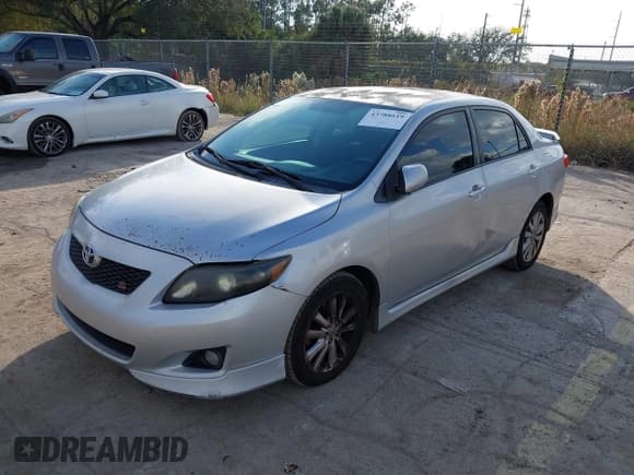 ✅ 2010 Toyota Corolla LE • VIN: 1NXBU4EE1AZ254556 • Lot: 43788619. Listed on IAAI with 242,877 mi. Free auction sales archive from the USA and detailed vehicle history report at DreamBid. Image 2.