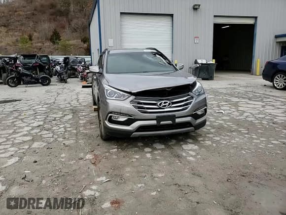 ✅ 2018 Hyundai Santa Fe 2.4L • VIN: 5NMZUDLB6JH090014 • Лот: 40852524. Опубликован ранее на Copart с пробегом Не указан. Бесплатный доступ к архиву аукционных продаж из США и подробный отчёт об истории автомобиля на DreamBid. Изображение 12.