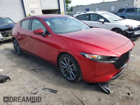 ✅ 2019 Mazda 3 • VIN: JM1BPBJM9K1140773 • Lot: 57002824. Listed on Copart with 76,804 mi. Free auction sales archive from the USA and detailed vehicle history report at DreamBid. Image 4.