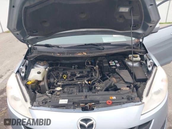 ✅ 2012 Mazda 5 Touring • VIN: JM1CW2CL7C0115096 • Lot: 42524956. Wystawiony na IAAI z przebiegiem 173 155 mil. Bezpłatny archiwum sprzedaży aukcyjnych z USA i szczegółowy raport historii pojazdu na DreamBid. Zdjęcie 10.