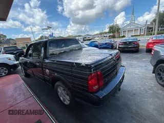 ✅ 2002 Lincoln Blackwood • VIN: 5LTEW05A22KJ02166 • Лот: 68308495. Опубликован ранее на Copart с пробегом 159 263 миль. Бесплатный доступ к архиву аукционных продаж из США и подробный отчёт об истории автомобиля на DreamBid. Изображение 3.