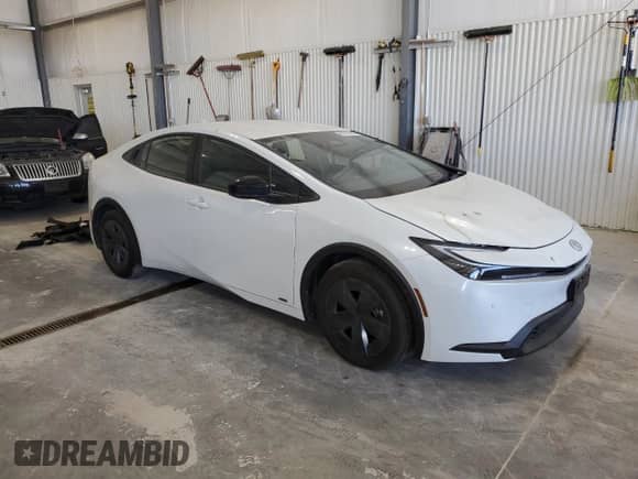 2024 Toyota Prius Limited with VIN JTDADABU9R3017082, listed as a Copart auction lot 85710085 with 9,983 mi miles and Salvage title. Bid and sale history available at DreamBid. Image 4.