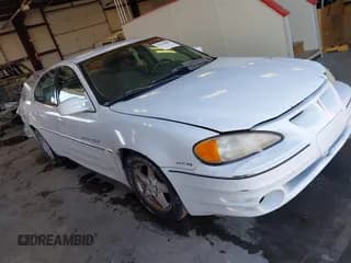 ✅ 1999 Pontiac Grand Am GT1 • VIN: 1G2NW52E2XM800431 • Lot: 41620806. Listed on IAAI with 164,257 mi. Free auction sales archive from the USA and detailed vehicle history report at DreamBid. Image 1.