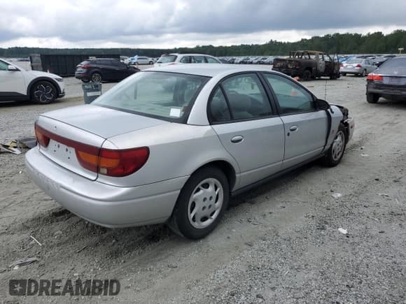 ✅ 2002 Saturn SL • VIN: 1G8ZK52702Z264191 • Лот: 70042825. Опубликован ранее на Copart с пробегом 118 826 миль. Бесплатный доступ к архиву аукционных продаж из США и подробный отчёт об истории автомобиля на DreamBid. Изображение 3.