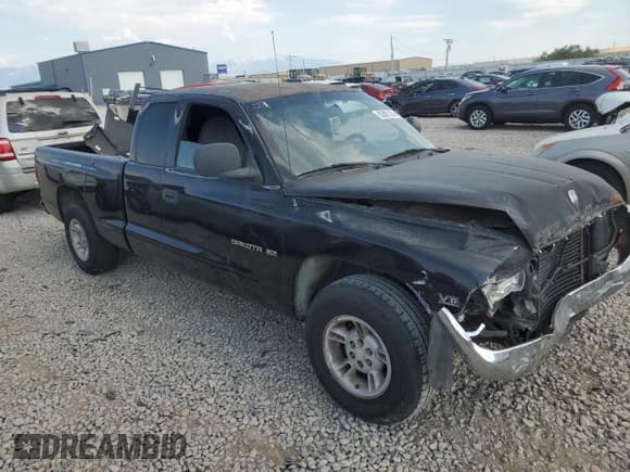 ✅ 1999 Dodge Dakota SLT • VIN: 1B7GL22X5XS298216 • Lot: 63887324. Wystawiony na Copart z przebiegiem Nie podano. Bezpłatny archiwum sprzedaży aukcyjnych z USA i szczegółowy raport historii pojazdu na DreamBid. Zdjęcie 4.