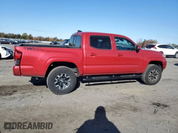 2022 Toyota Tacoma SR with VIN 3TMCZ5ANXNM470356, listed as a Copart auction lot 82718045 with 37,525 mi miles and Salvage title. Bid and sale history available at DreamBid. Image 3.
