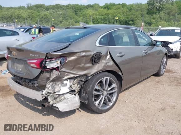 2020 Chevrolet Malibu Premier with VIN 1G1ZE5SX5LF051794, listed as a IAAI auction lot 42431059 with 55,784 mi miles and . Bid and sale history available at DreamBid. Image 4.