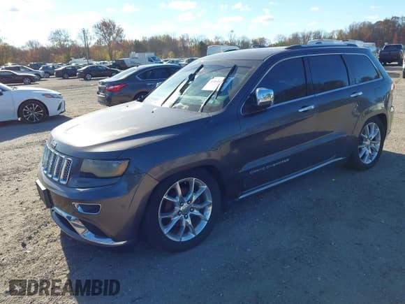 ✅ 2014 Jeep Grand Cherokee Summit • VIN: 1C4RJFJG3EC450430 • Lot: 43644134. Listed on IAAI with 156,670 mi. Free auction sales archive from the USA and detailed vehicle history report at DreamBid. Image 2.