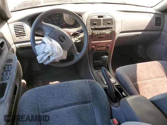 ✅ 2006 Kia Optima LX • VIN: KNAGD126665468978 • Lot: 59178705. Listed on Copart with 145,046 mi. Free auction sales archive from the USA and detailed vehicle history report at DreamBid. Image 8.