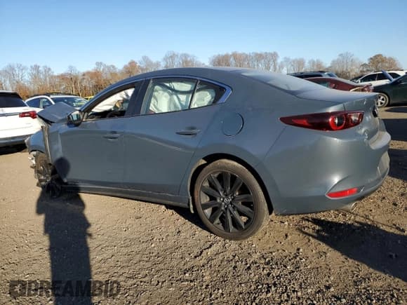 ✅ 2024 Mazda 3 S Carbon Edition • VIN: 3MZBPBCM1RM414202 • Lot: 92866385. Listed on Copart with Not provided. Free auction sales archive from the USA and detailed vehicle history report at DreamBid. Image 2.