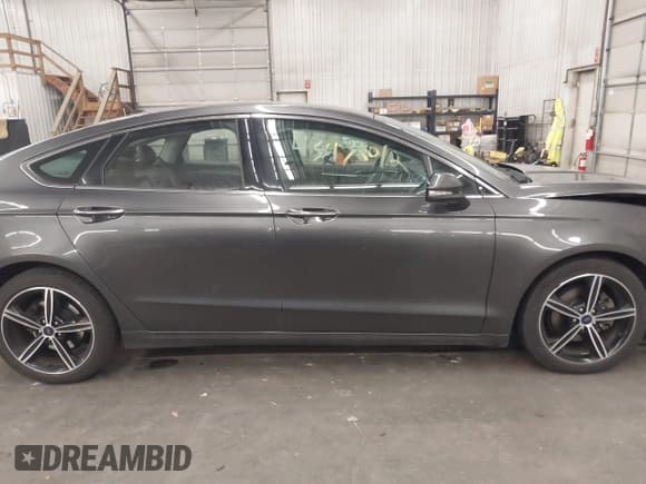 ✅ 2015 Ford Fusion Titanium • VIN: 3FA6P0D98FR116771 • Лот: 43478012. Опубликован ранее на IAAI с пробегом 143 550 миль. Бесплатный доступ к архиву аукционных продаж из США и подробный отчёт об истории автомобиля на DreamBid. Изображение 14.