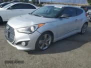 ✅ 2013 Hyundai Veloster Turbo • VIN: KMHTC6AEXDU140813 • Lot: 42228855. Wystawiony na Copart z przebiegiem 100 627 mil. Bezpłatny archiwum sprzedaży aukcyjnych z USA i szczegółowy raport historii pojazdu na DreamBid. Zdjęcie 1.