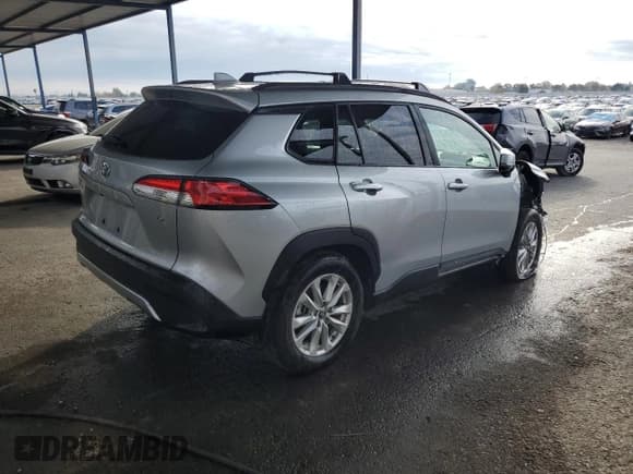 ✅ 2022 Toyota Corolla Cross LE • VIN: 7MUCAAAG7NV036483 • Lot: 92058475. Listed on Copart with 73,521 mi. Free auction sales archive from the USA and detailed vehicle history report at DreamBid. Image 3.