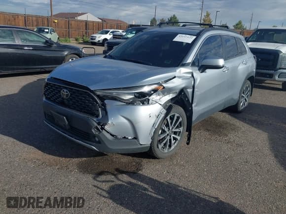 ✅ 2023 Toyota Corolla Cross XLE • VIN: 7MUDAABG7PV077220 • Lot: 43137122. Listed on IAAI with 37,620 mi. Free auction sales archive from the USA and detailed vehicle history report at DreamBid. Image 17.
