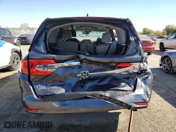 ✅ 2018 Honda Odyssey • VIN: 5FNRL6H40JB503782 • Лот: 84540005. Опубликован ранее на Copart с пробегом 208 471 миль. Бесплатный доступ к архиву аукционных продаж из США и подробный отчёт об истории автомобиля на DreamBid. Изображение 6.