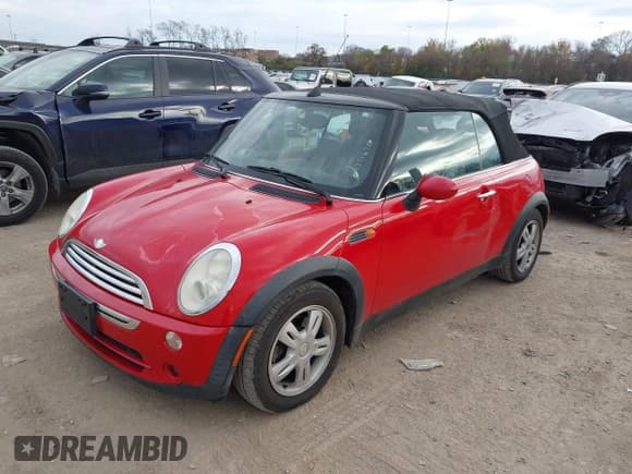 ✅ 2006 MINI Convertible • VIN: WMWRF33516TG14383 • Lot: 43716738. Listed on IAAI with 153,259 mi. Free auction sales archive from the USA and detailed vehicle history report at DreamBid. Image 2.