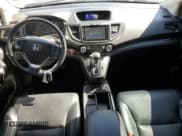 ✅ 2015 Honda CR-V Touring • VIN: 5J6RM3H97FL016486 • Лот: 71102825. Опубликован ранее на Copart с пробегом 112 214 миль. Бесплатный доступ к архиву аукционных продаж из США и подробный отчёт об истории автомобиля на DreamBid. Изображение 8.