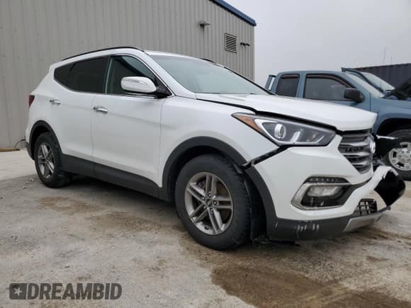 ✅ 2017 Hyundai Santa Fe 2.4L • VIN: 5XYZUDLB4HG418390 • Лот: 55275014. Опубликован ранее на Copart с пробегом 69 981 миль. Бесплатный доступ к архиву аукционных продаж из США и подробный отчёт об истории автомобиля на DreamBid. Изображение 4.