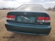 ✅ 1999 Honda Civic EX • VIN: 1HGEJ8145XL087570 • Lot: 64837915. Listed on Copart with 265,854 mi. Free auction sales archive from the USA and detailed vehicle history report at DreamBid. Image 6.