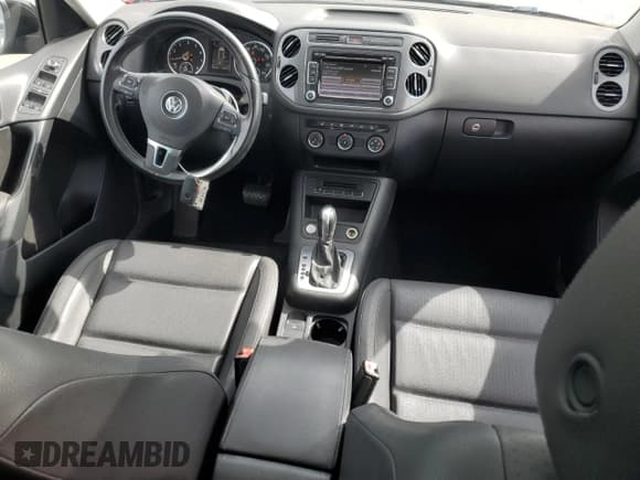 ✅ 2015 Volkswagen Tiguan SEL • VIN: WVGBV7AX5FW568681 • Lot: 91200685. Listed on Copart with 79,132 mi. Free auction sales archive from the USA and detailed vehicle history report at DreamBid. Image 8.