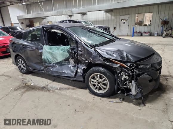 ✅ 2021 Toyota Prius XLE • VIN: JTDKAMFP8M3182178 • Lot: 93390195. Listed on Copart with Not provided. Free auction sales archive from the USA and detailed vehicle history report at DreamBid. Image 4.