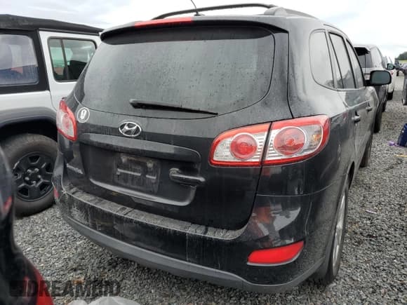 ✅ 2012 Hyundai Santa Fe SE • VIN: 5XYZH4AG1CG164374 • Lot: 74459054. Listed on Copart with Not provided. Free auction sales archive from the USA and detailed vehicle history report at DreamBid. Image 6.