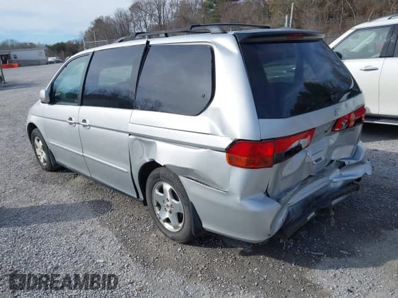 ✅ 2001 Honda Odyssey EX • VIN: 2HKRL18611H601564 • Lot: 43683828. Listed on IAAI with 184,613 mi. Free auction sales archive from the USA and detailed vehicle history report at DreamBid. Image 3.