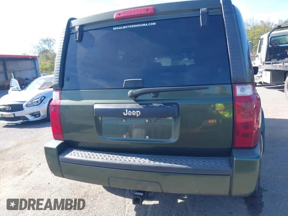 ✅ 2007 Jeep Commander Sport • VIN: 1J8HH48K67C533772 • Lot: 41033399. Listed on IAAI with 295,552 mi. Free auction sales archive from the USA and detailed vehicle history report at DreamBid. Image 16.