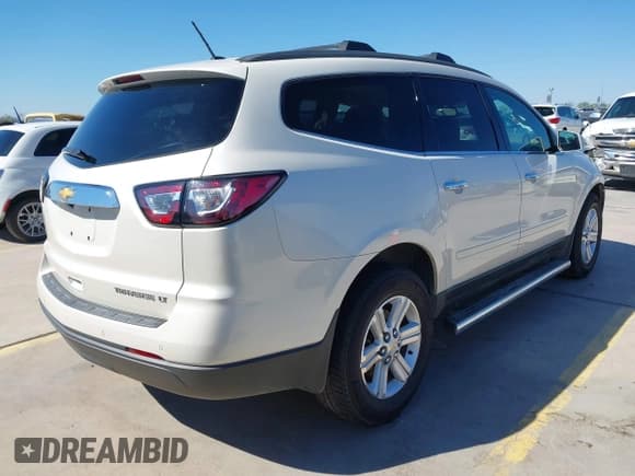✅ 2013 Chevrolet Traverse LT • VIN: 1GNKRJKD0DJ146474 • Lot: 43599335. Listed on IAAI with 102,254 mi. Free auction sales archive from the USA and detailed vehicle history report at DreamBid. Image 4.