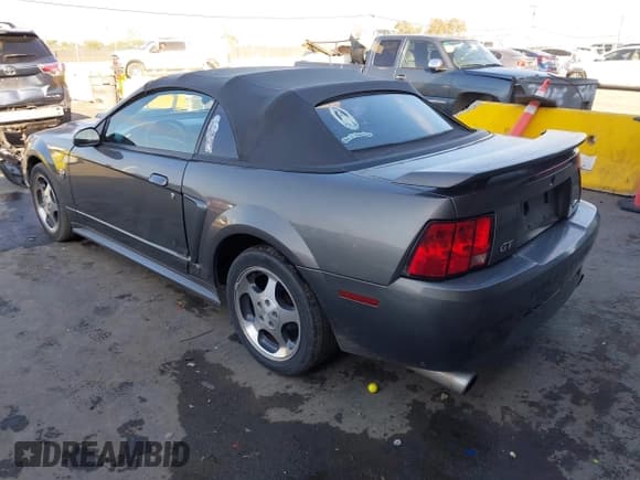 ✅ 2004 Ford Mustang Deluxe • VIN: 1FAFP44644F196058 • Lot: 43810293. Listed on IAAI with 136,950 mi. Free auction sales archive from the USA and detailed vehicle history report at DreamBid. Image 3.
