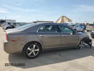 ✅ 2012 Chevrolet Malibu 1LT • VIN: 1G1ZC5E02CF231383 • Lot: 67975504. Listed on Copart with 136,182 mi. Free auction sales archive from the USA and detailed vehicle history report at DreamBid. Image 3.