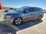✅ 2015 Honda Odyssey Touring Elite • VIN: 5FNRL5H92FB009632 • Lot: 90638145. Listed on Copart with 169,872 mi. Free auction sales archive from the USA and detailed vehicle history report at DreamBid. Image 1.