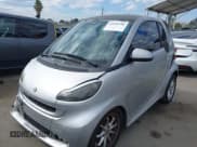 ✅ 2009 Smart fortwo Pure • VIN: WMEEJ31X39K285621 • Лот: 43298780. Опубликован ранее на IAAI с пробегом 148 496 миль. Бесплатный доступ к архиву аукционных продаж из США и подробный отчёт об истории автомобиля на DreamBid. Изображение 2.