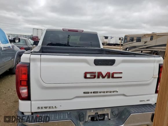 ✅ 2021 GMC Sierra 1500 SLE • VIN: 1GTR9BEDXMZ415428 • Лот: 53950975. Опубликован ранее на Copart с пробегом 218 710 миль. Бесплатный доступ к архиву аукционных продаж из США и подробный отчёт об истории автомобиля на DreamBid. Изображение 6.