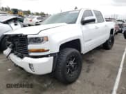 ✅ 2018 Chevrolet Silverado 1500 LT • VIN: 3GCUKRECXJG604123 • Lot: 42725721. Listed on Copart with 54,201 mi. Free auction sales archive from the USA and detailed vehicle history report at DreamBid. Image 2.