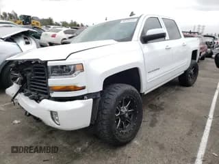 ✅ 2018 Chevrolet Silverado 1500 LT • VIN: 3GCUKRECXJG604123 • Лот: 42725721. Опубликован ранее на Copart с пробегом 54 201 миль. Бесплатный доступ к архиву аукционных продаж из США и подробный отчёт об истории автомобиля на DreamBid. Изображение 2.