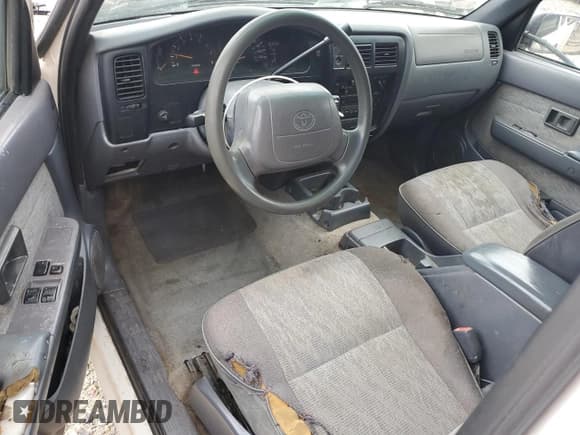 ✅ 1999 Toyota Tacoma • VIN: 4TAVL52N3XZ523937 • Lot: 66933295. Listed on Copart with 284,029 mi. Free auction sales archive from the USA and detailed vehicle history report at DreamBid. Image 8.