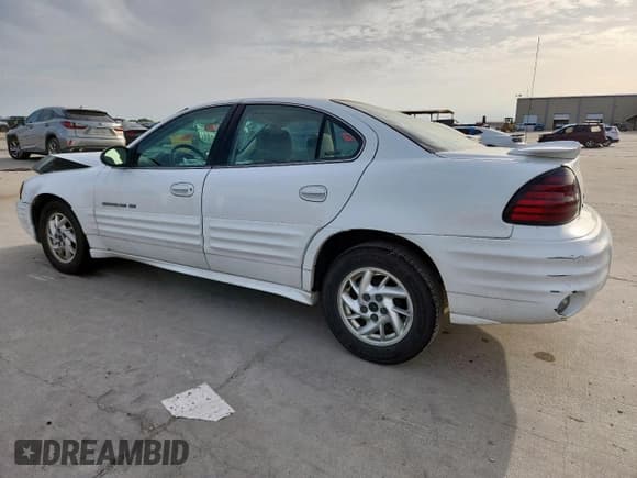✅ 2002 Pontiac Grand Am SE1 • VIN: 1G2NF52F82C143674 • Lot: 63407435. Listed on Copart with 111,082 mi. Free auction sales archive from the USA and detailed vehicle history report at DreamBid. Image 2.