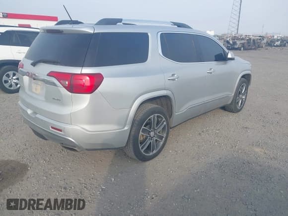 ✅ 2018 GMC Acadia Denali • VIN: 1GKKNXLS0JZ125646 • Lot: 43703983. Listed on IAAI with 148,550 mi. Free auction sales archive from the USA and detailed vehicle history report at DreamBid. Image 4.