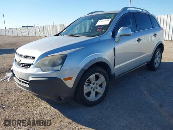 2015 Chevrolet Captiva Sport LS z VIN 3GNAL2EK1FS527166, wystawiony jako IAAI lot #43606030 z przebiegiem 149 603 mil mil oraz . Historia ofert i sprzedaży dostępna na DreamBid. Obrazek 2.