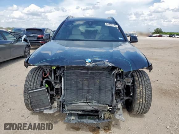 ✅ 2022 BMW X7 M50i • VIN: 5UXCX6C09N9M37665 • Lot: 64224705. Wystawiony na Copart z przebiegiem 54 647 mil. Bezpłatny archiwum sprzedaży aukcyjnych z USA i szczegółowy raport historii pojazdu na DreamBid. Zdjęcie 5.