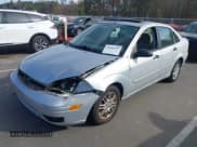 ✅ 2005 Ford Focus S • VIN: 1FAFP34NX5W112117 • Lot: 43689757. Listed on IAAI with 187,624 mi. Free auction sales archive from the USA and detailed vehicle history report at DreamBid. Image 2.