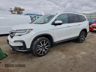 ✅ 2022 Honda Pilot Touring 8-Passenger • VIN: 5FNYF6H95NB016078 • Lot: 94960535. Listed on Copart with 22,526 mi. Free auction sales archive from the USA and detailed vehicle history report at DreamBid. Image 1.