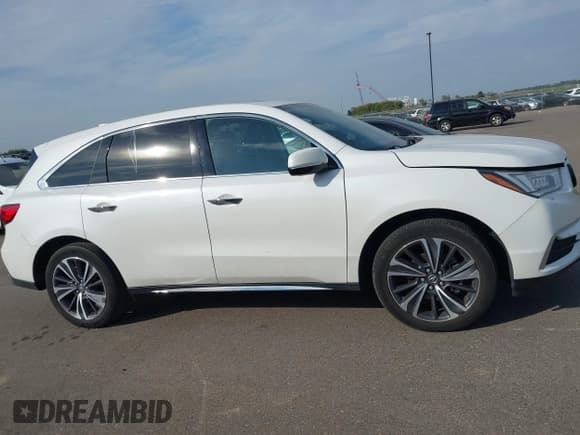 ✅ 2020 Acura MDX Technology • VIN: 5J8YD4H51LL013181 • Lot: 43355668. Wystawiony na IAAI z przebiegiem 58 946 mil. Bezpłatny archiwum sprzedaży aukcyjnych z USA i szczegółowy raport historii pojazdu na DreamBid. Zdjęcie 13.
