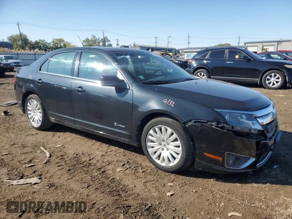 ✅ 2010 Ford Fusion Hybrid • VIN: 3FADP0L34AR272402 • Лот: 86312755. Опубликован ранее на Copart с пробегом 100 148 миль. Бесплатный доступ к архиву аукционных продаж из США и подробный отчёт об истории автомобиля на DreamBid. Изображение 4.